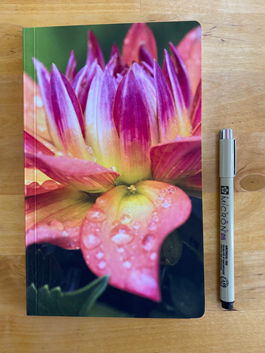 product photo:  notebook with pen