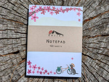 Load image into Gallery viewer, Spring Biking Pup Notepad (provides 6 meals)