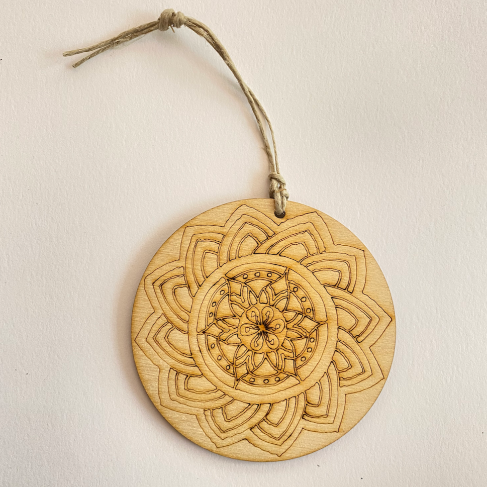Wooden Color your own ornament. Circular shape with a layered design 