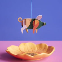 Load image into Gallery viewer, Product photo - pig ornament hanging over flower dish