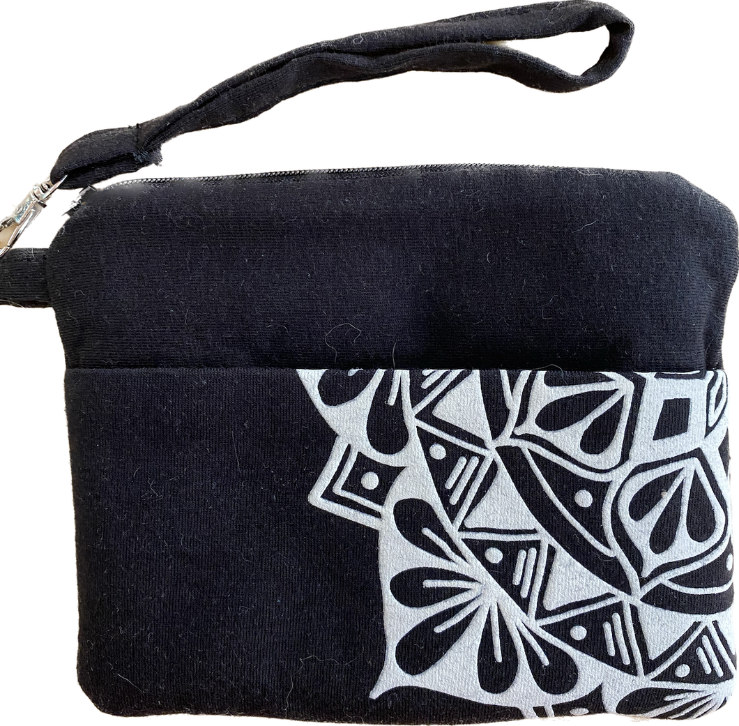 product photo:  black clutch with ivory design