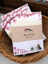 Load image into Gallery viewer, Spring Biking Pup Notepad (provides 6 meals)