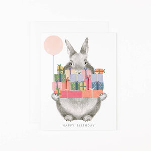 Card with a Bunny holding  Gifts and a balloon