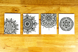 Image of the 4 Mandala note cards displayed on a table