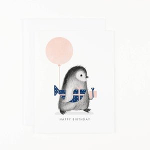 Penguin with Wrapped Fish