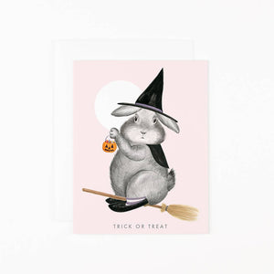 Bunny Witch riding a broomstick with the words - Trick or Treat