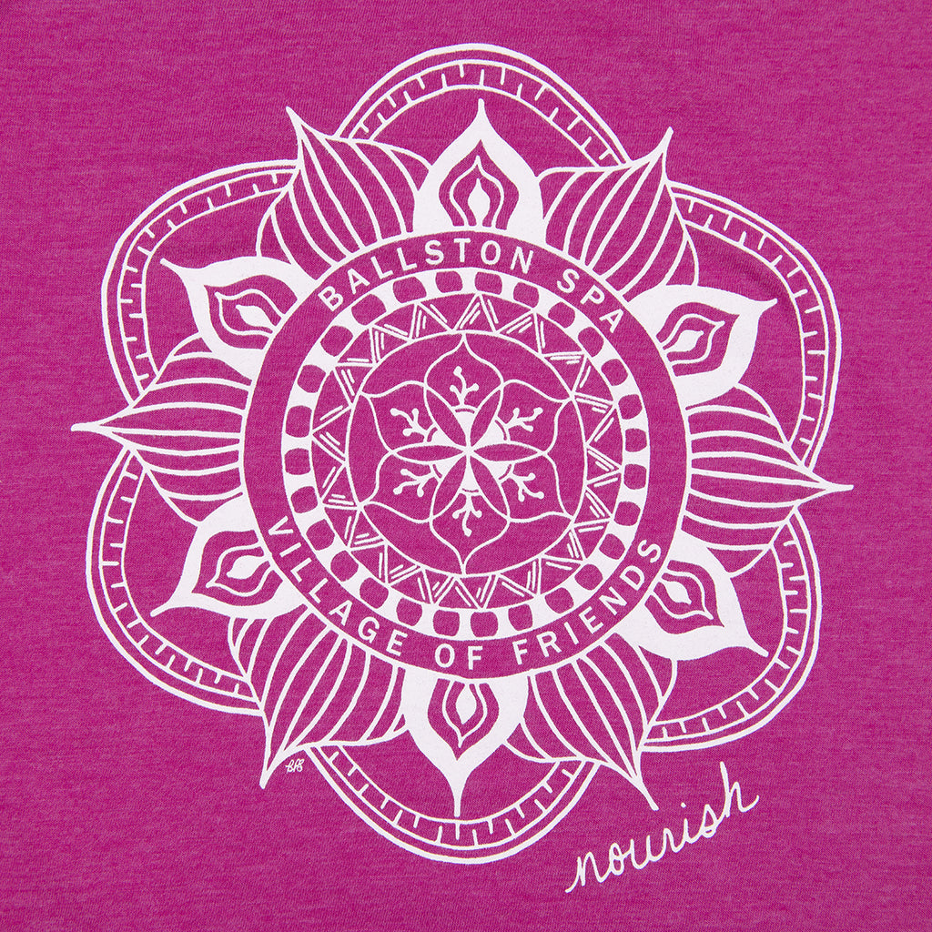 Close up of Ballston Spa Village of Friends mandala design - white on pink