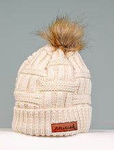 Load image into Gallery viewer, Ivory Cable Knit Hat with leather Nourish tag and a pom pom