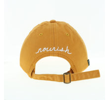 Load image into Gallery viewer, Product Image : View of the back of the hat with the nourish word embroidered in white - (Shown with the yellow hat)